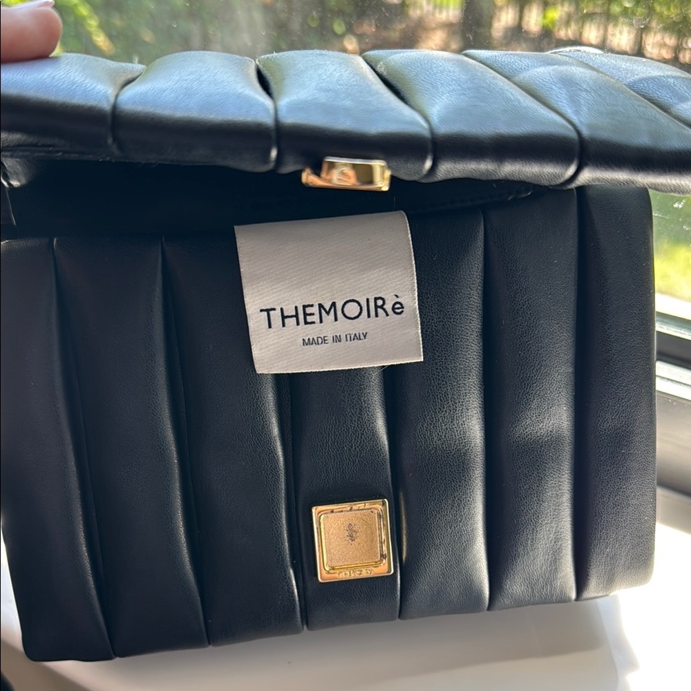 Thermoire black vegan leather cross body with card holder.